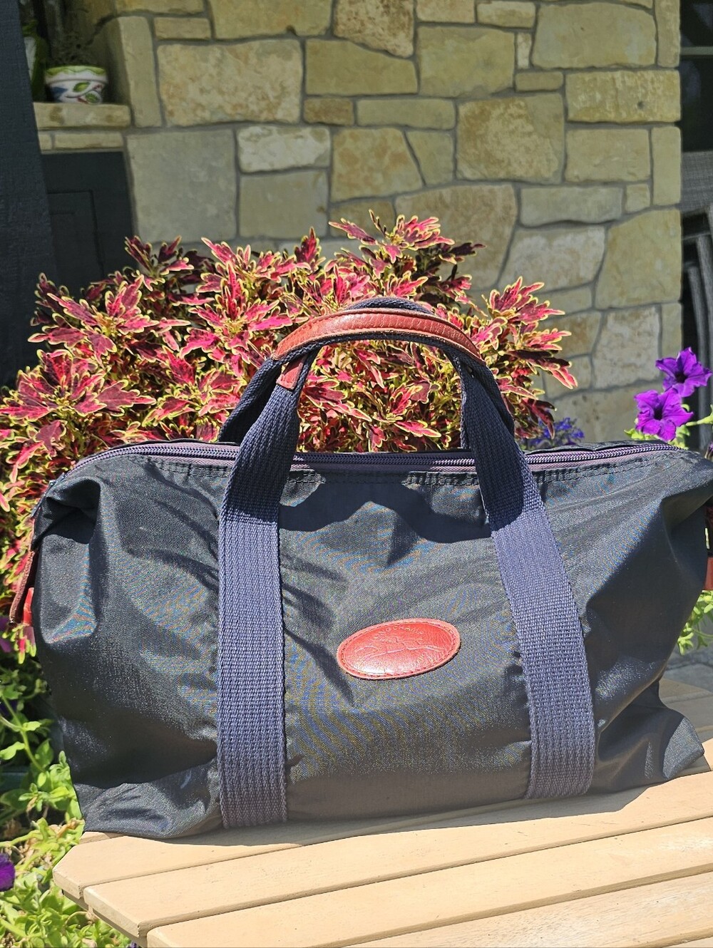 Longchamp nylon travel duffle bag.